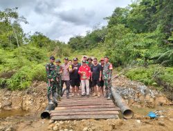 Sinergi TNI-POLRI dan Masyarakat Gotong Royong dalam Pembangunan Jembatan Darurat Desa Bantian